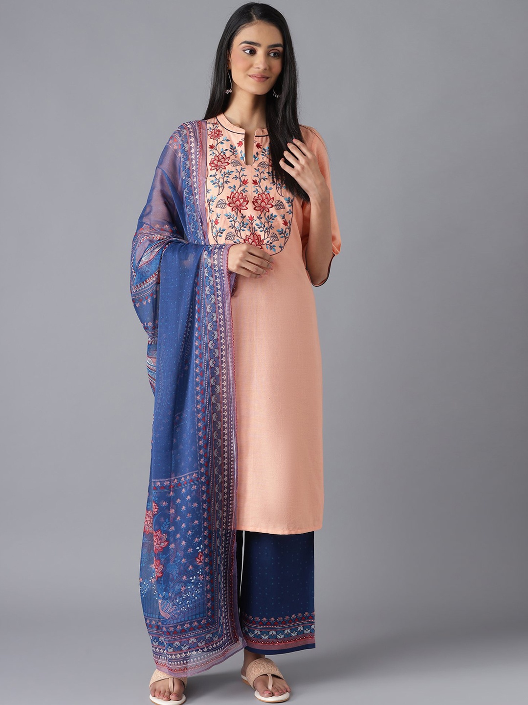 

AURELIA Women Peach-Coloured Floral Embroidered Kurta with Palazzos & With Dupatta