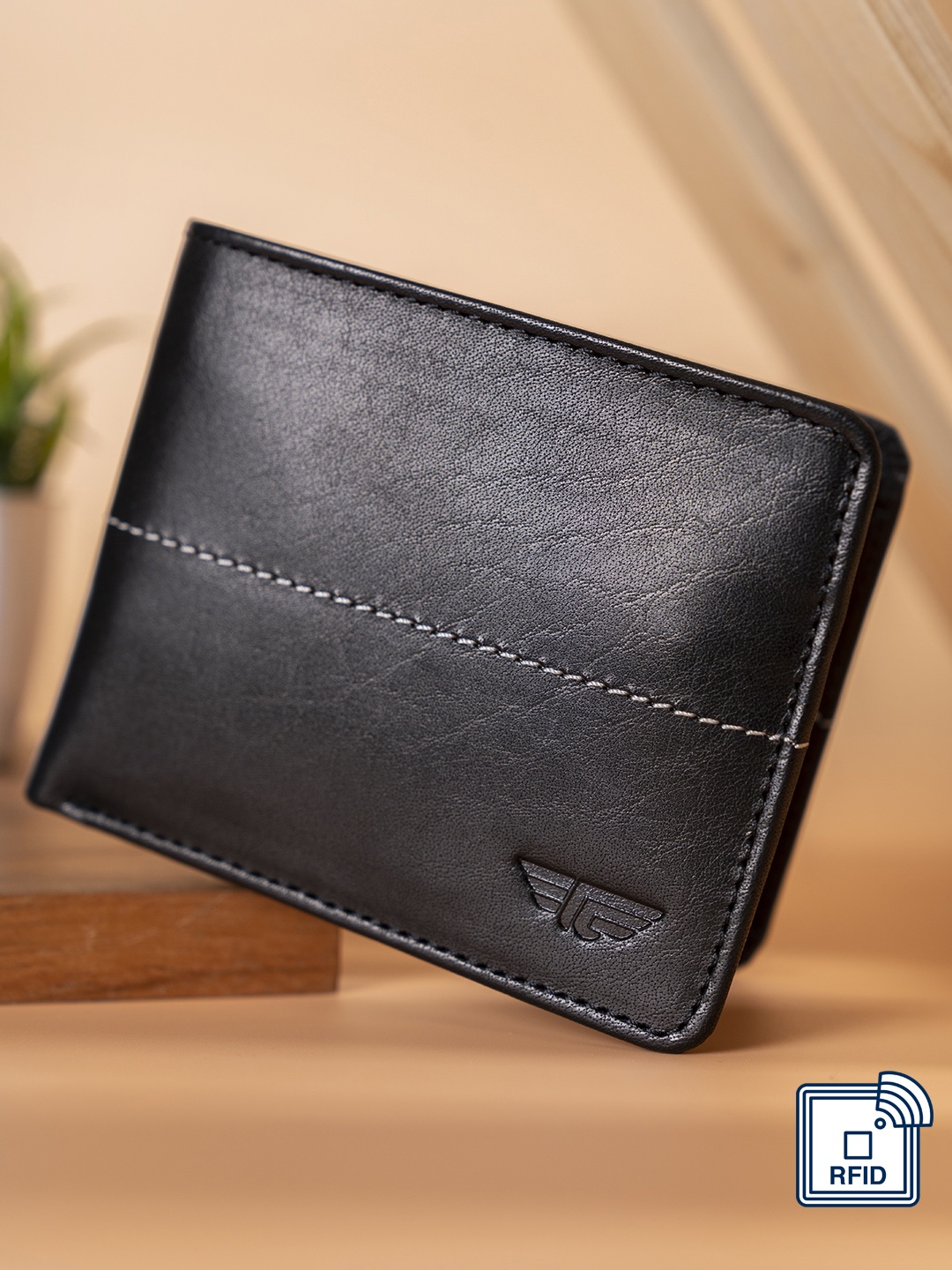 

Red Tape Men Black Textured Leather Two Fold Wallet