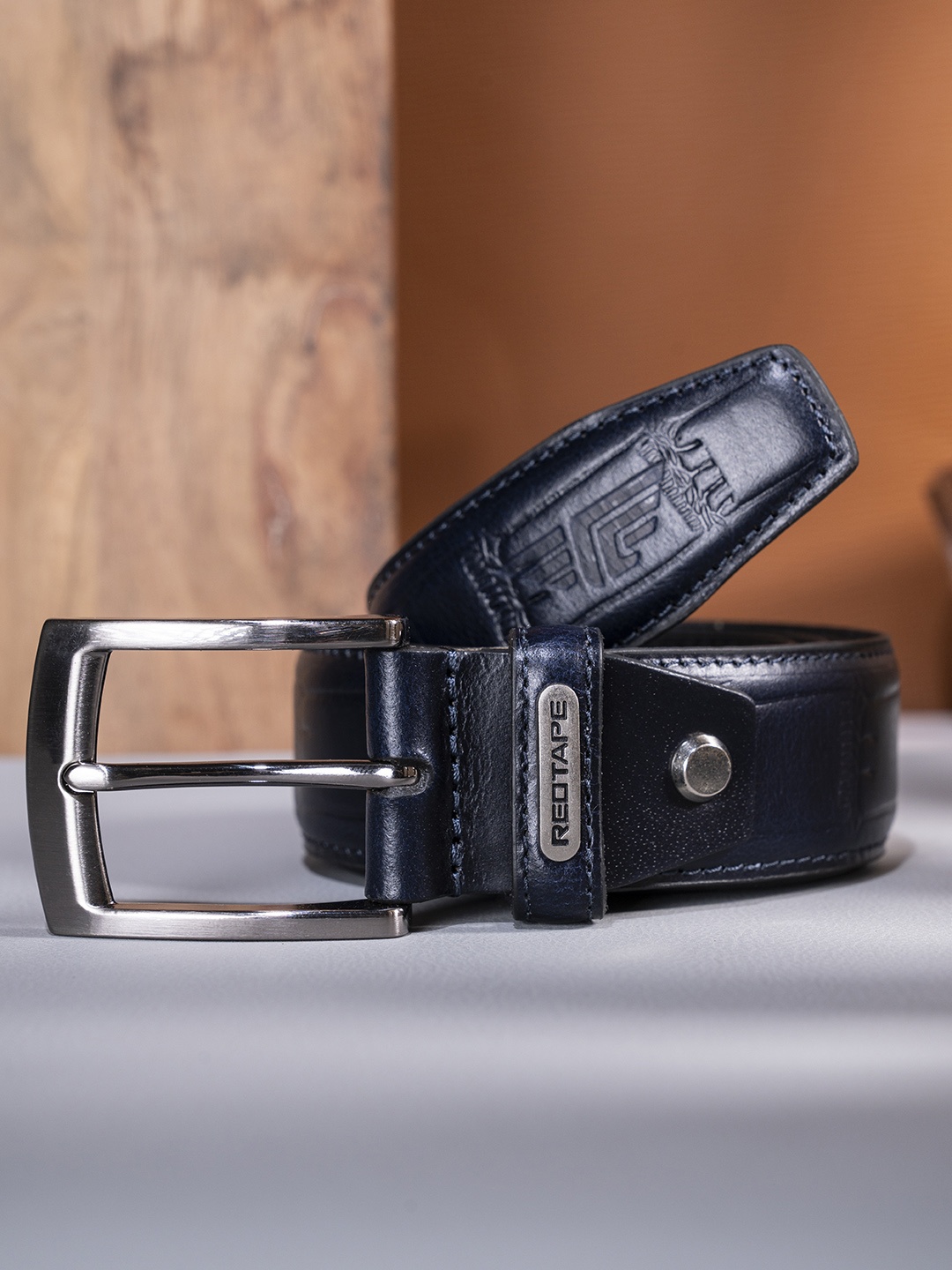 

Red Tape Men Navy Blue Textured Leather Belt