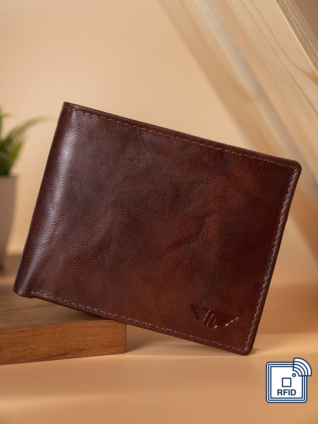 

Red Tape Men Brown Textured Leather Two Fold Wallet