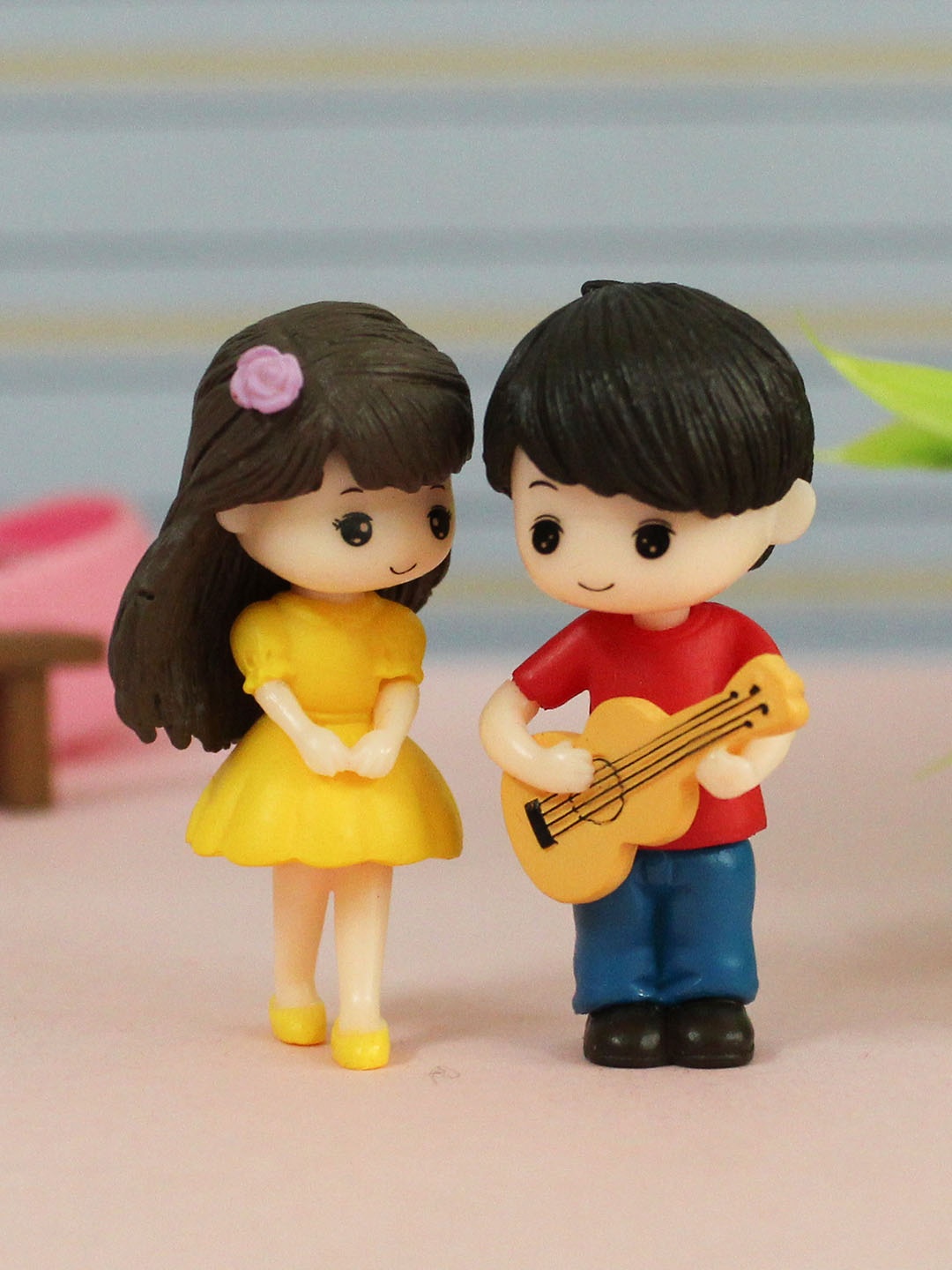 

TIED RIBBONS Red & Yellow Valentine Miniature Romantic Love Couple with Guitar Showpiece