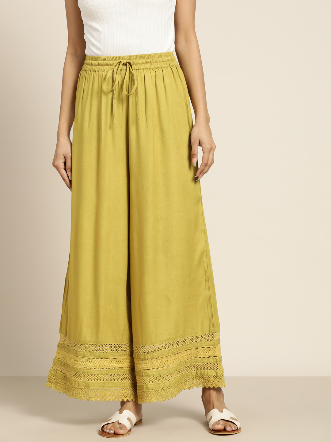 

Sangria Women Olive Green Solid Ethnic Palazzos with Lace Inserts