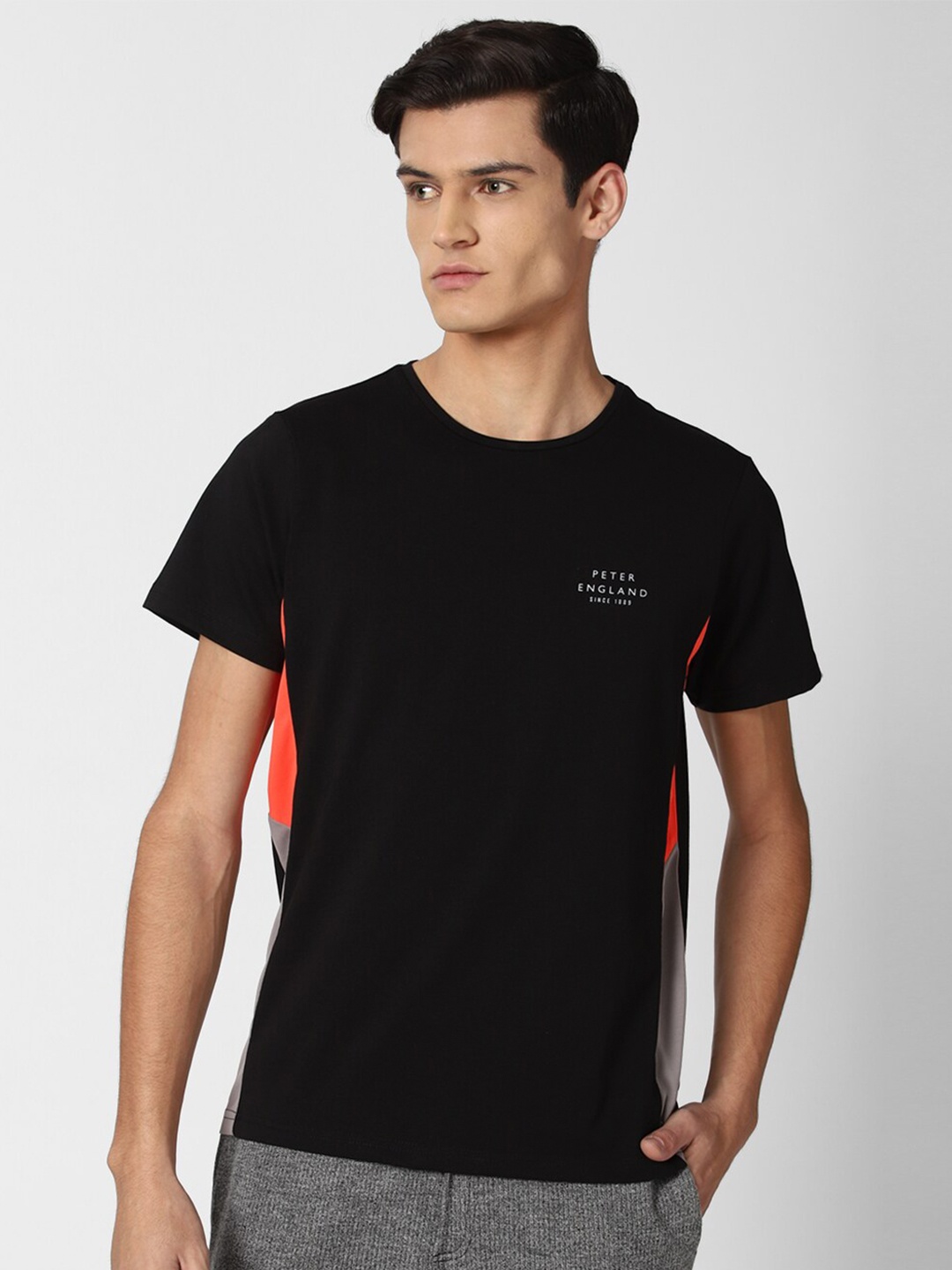 

Peter England Men Black Solid T-shirt