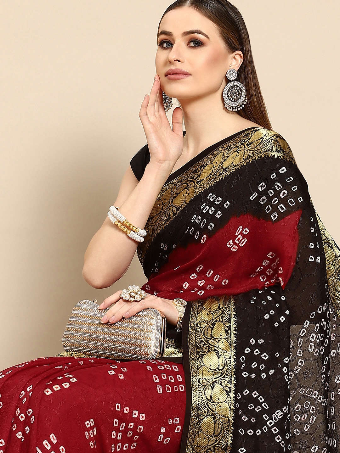 

Anouk Maroon & Black Bandhani Art Silk Saree
