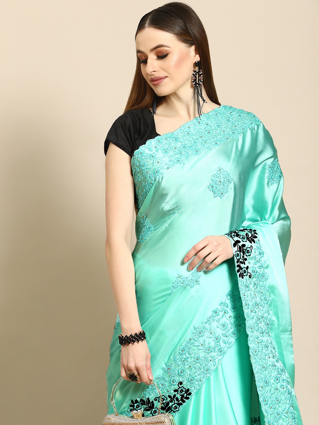 

Anouk Sea Green Ethnic Motifs Satin Saree