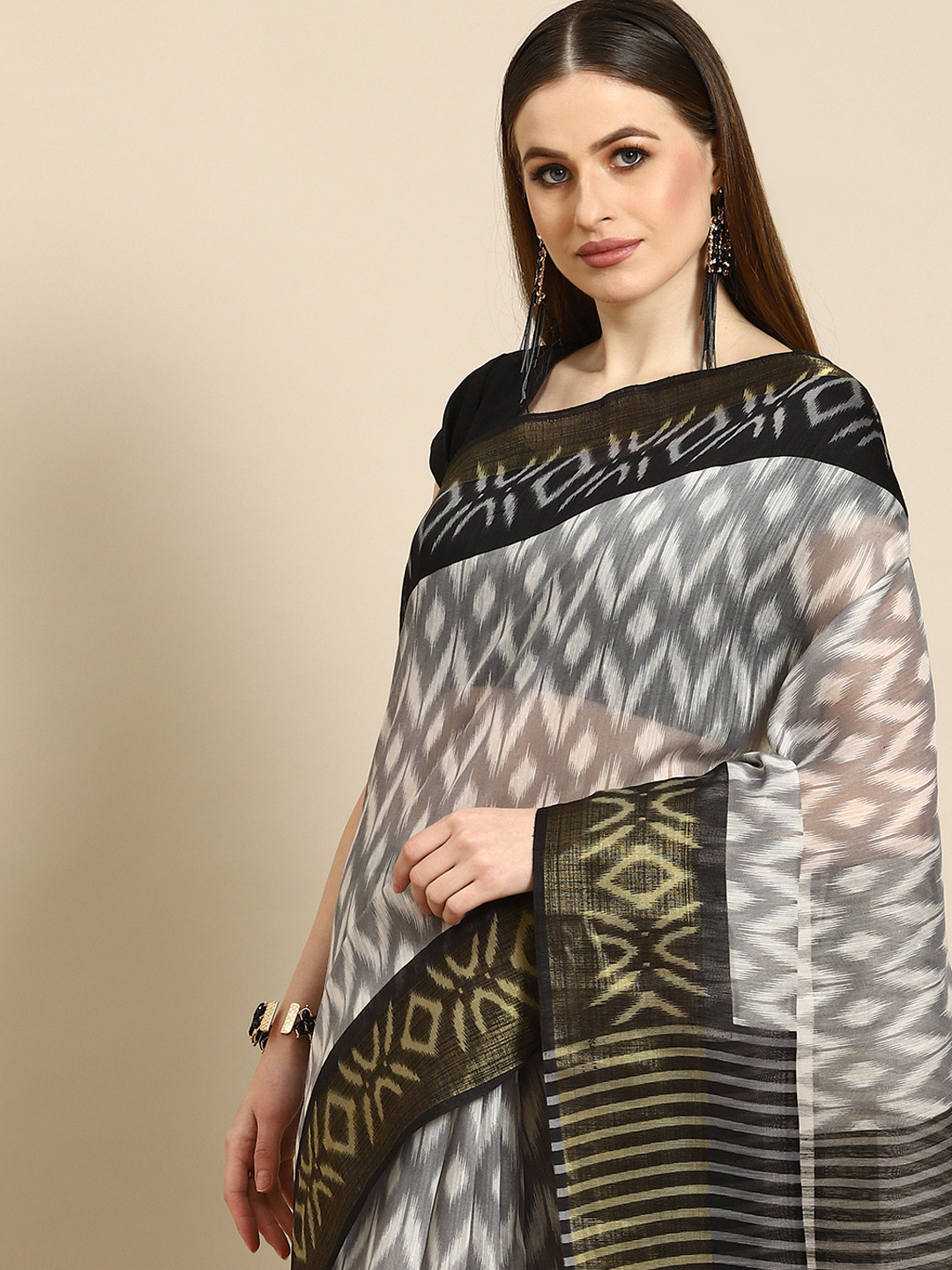 

Anouk Black & White Ethnic Motifs Cotton Blend Saree