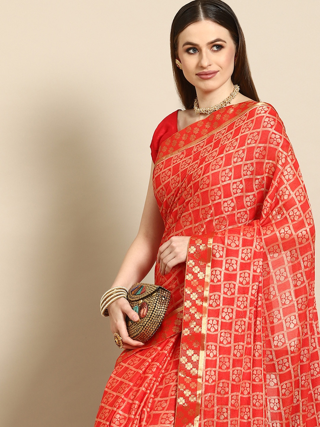 

Anouk Red & Gold-Toned Ethnic Motifs Polyester Saree