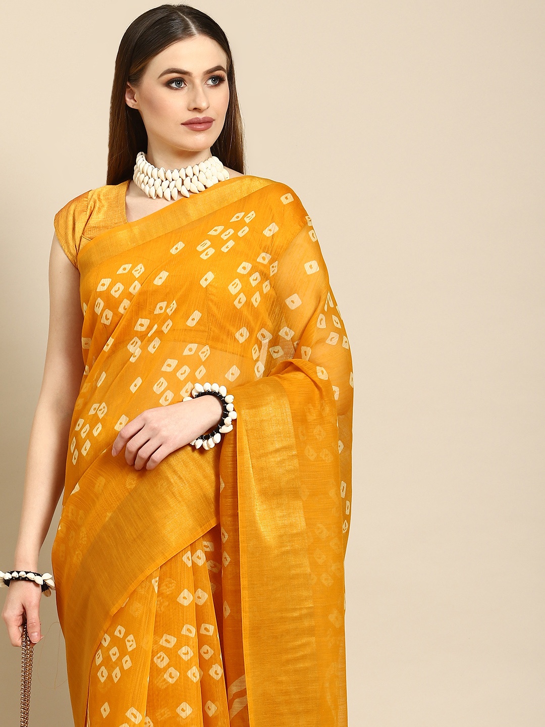 

Anouk Mustard Bandhani Cotton Blend Saree