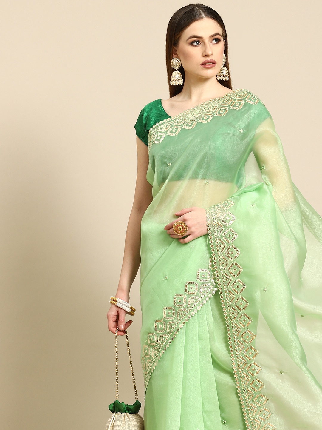 

Anouk Green Organza Saree With Embroidered Border
