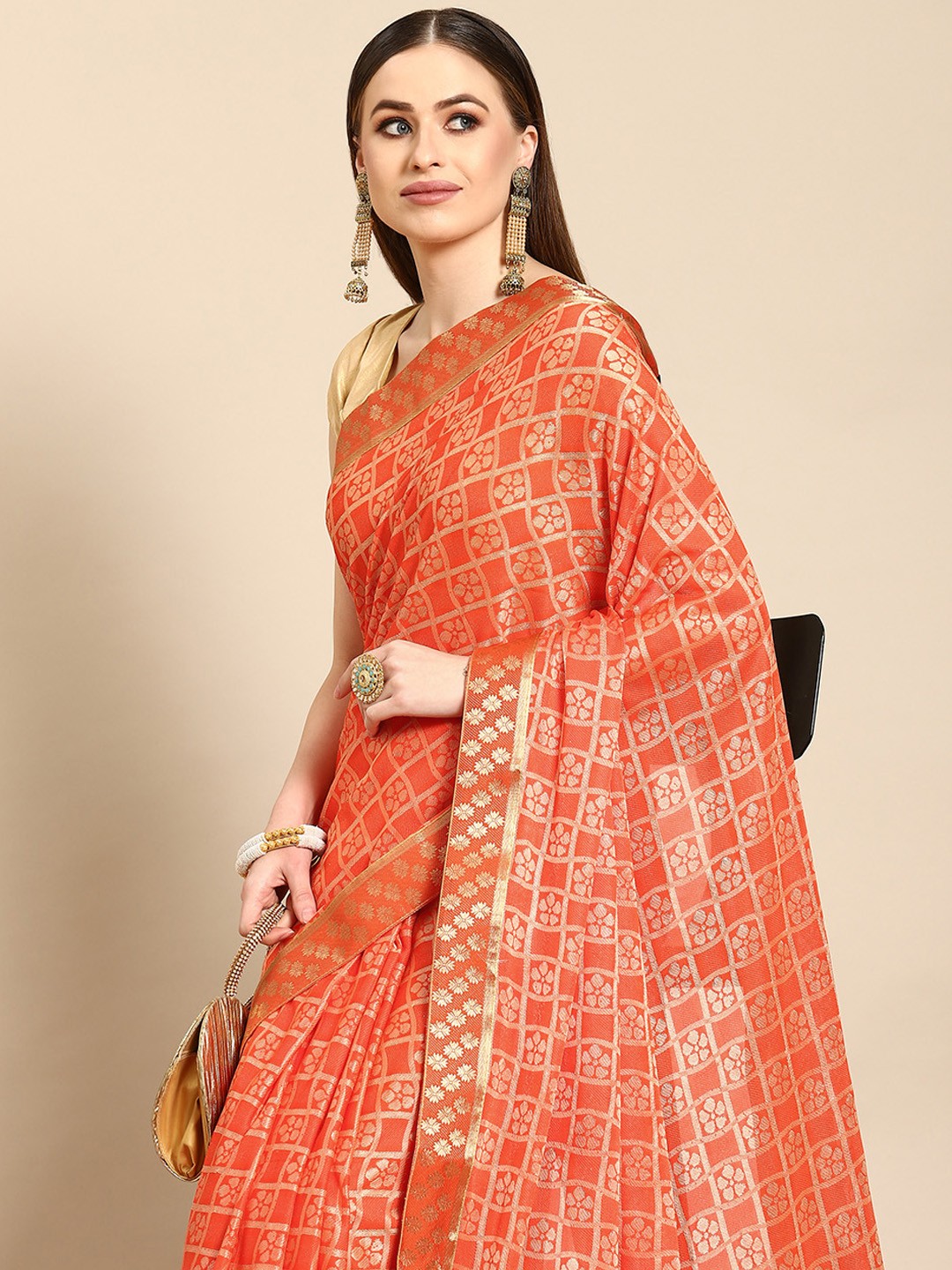 

Anouk Orange & Gold-Toned Woven Design Saree