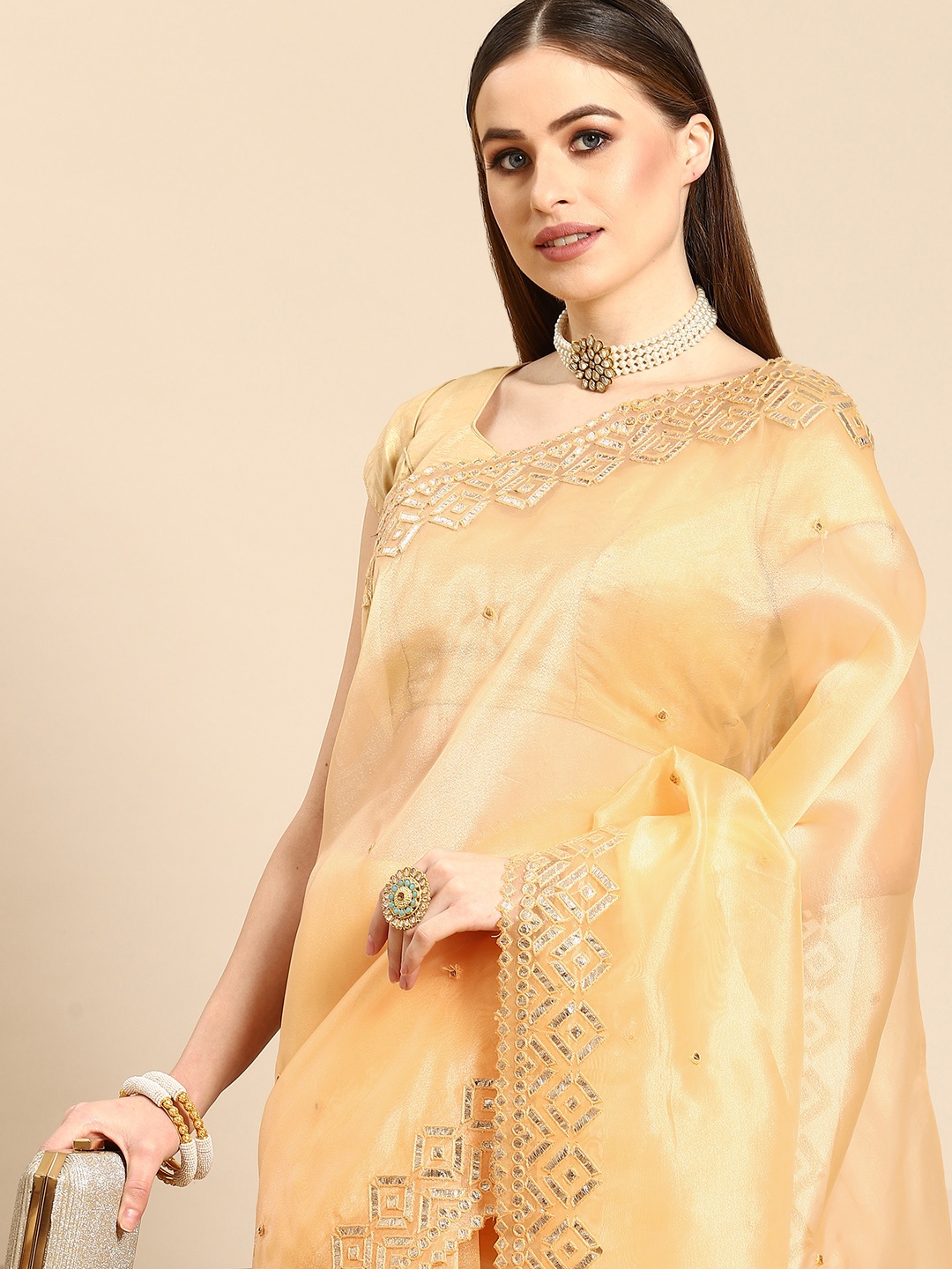 

Anouk Orange & Silver-Toned Organza Embroidered Saree