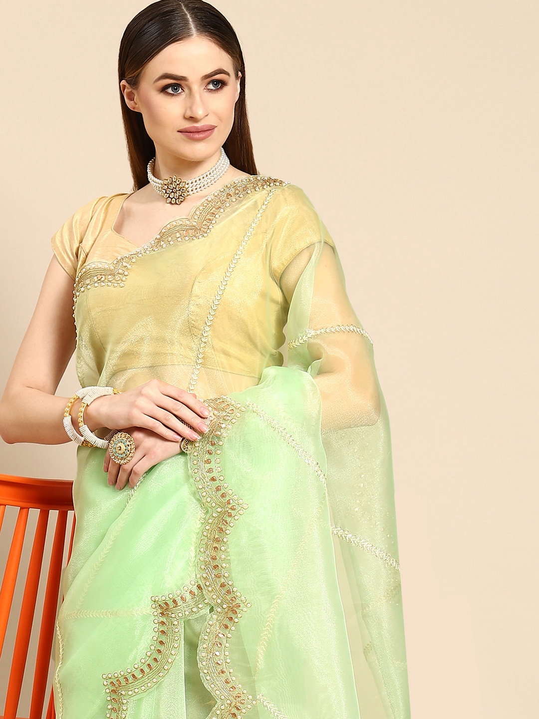 

Anouk Sea Green & Yellow Ethnic Motifs Embroidered Organza Saree