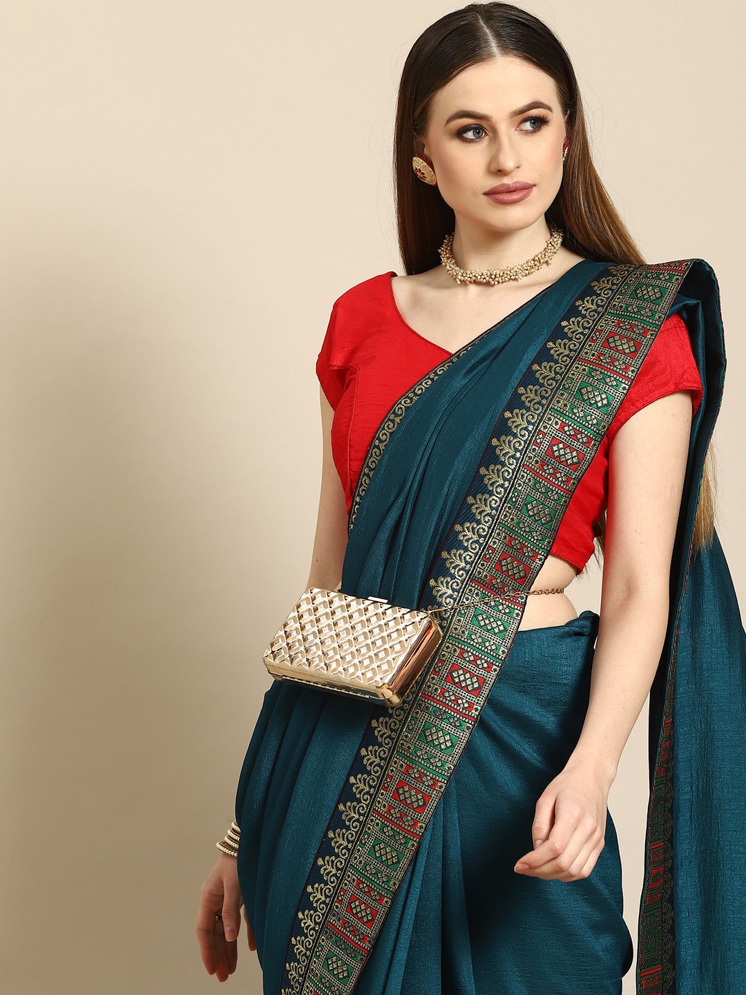 

Anouk Teal Blue Cotton Blend Saree With Woven Design Border
