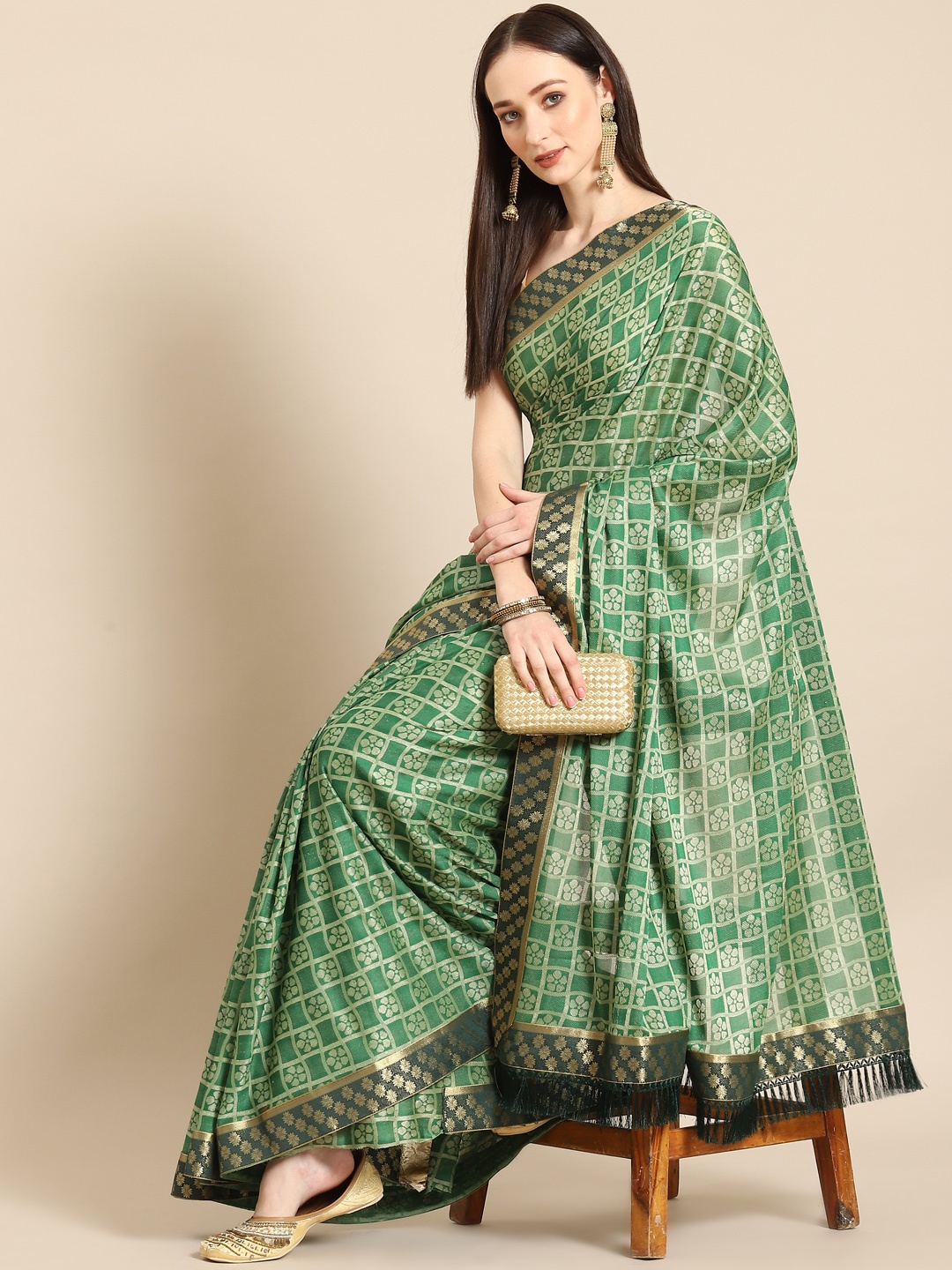 

Anouk Green & Golden Ethnic Motifs Saree