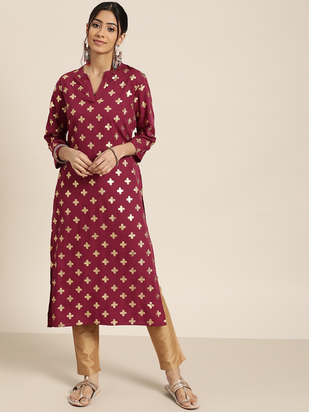 

Sangria Women Maroon & Golden Ethnic Motifs Printed Straight Kurta