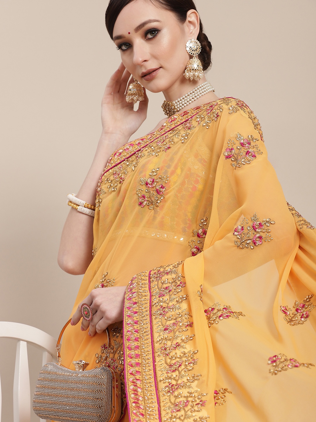 

Chhabra 555 Mustard & Yellow Floral Beads and Stones Saree