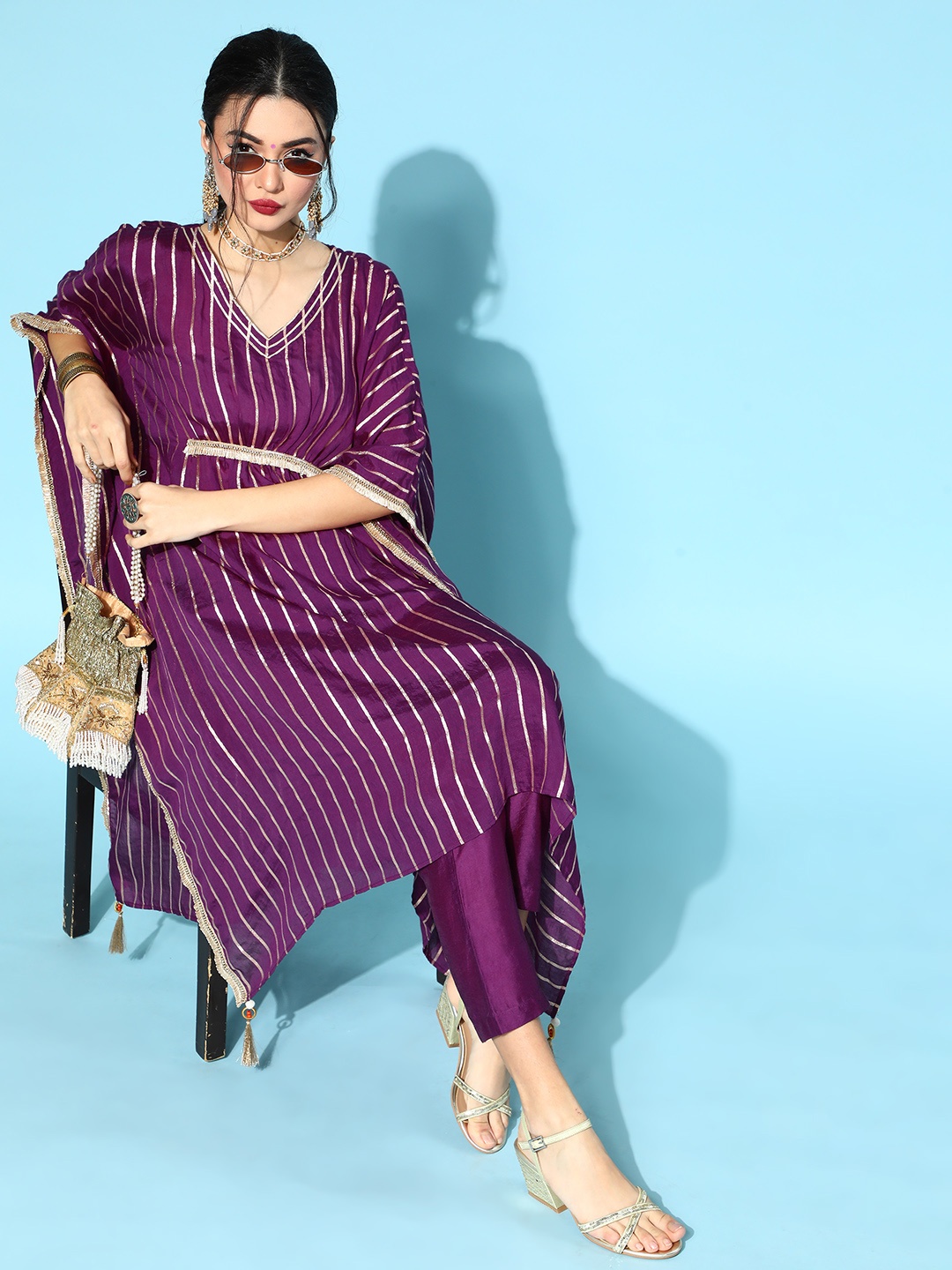 

Varanga Women Purple & Golden Striped Kaftan Kurta Set