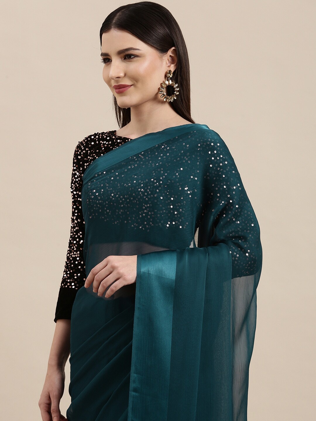 

KALINI Teal Blue Solid Saree