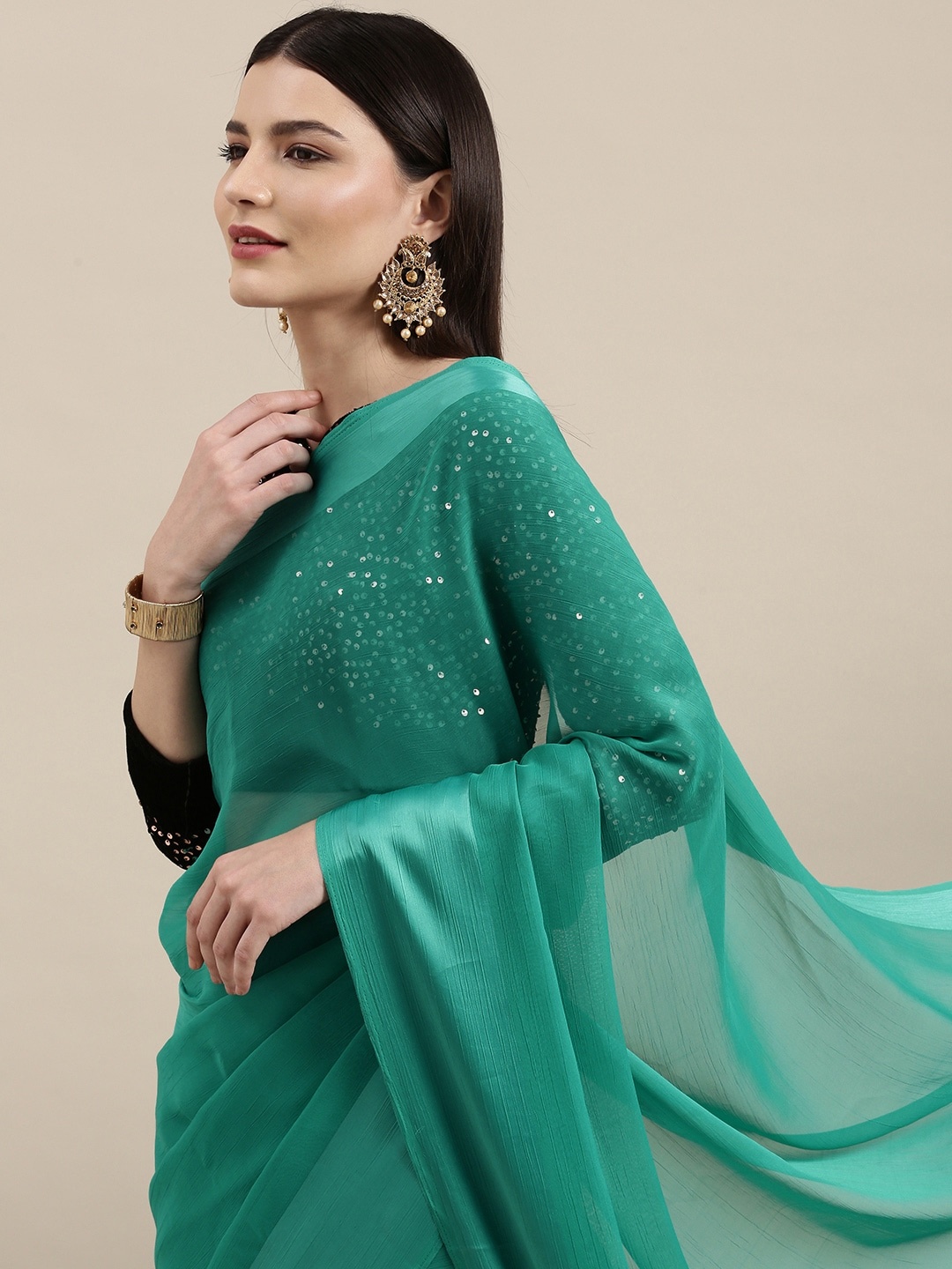 

KALINI Sea Green Solid Saree