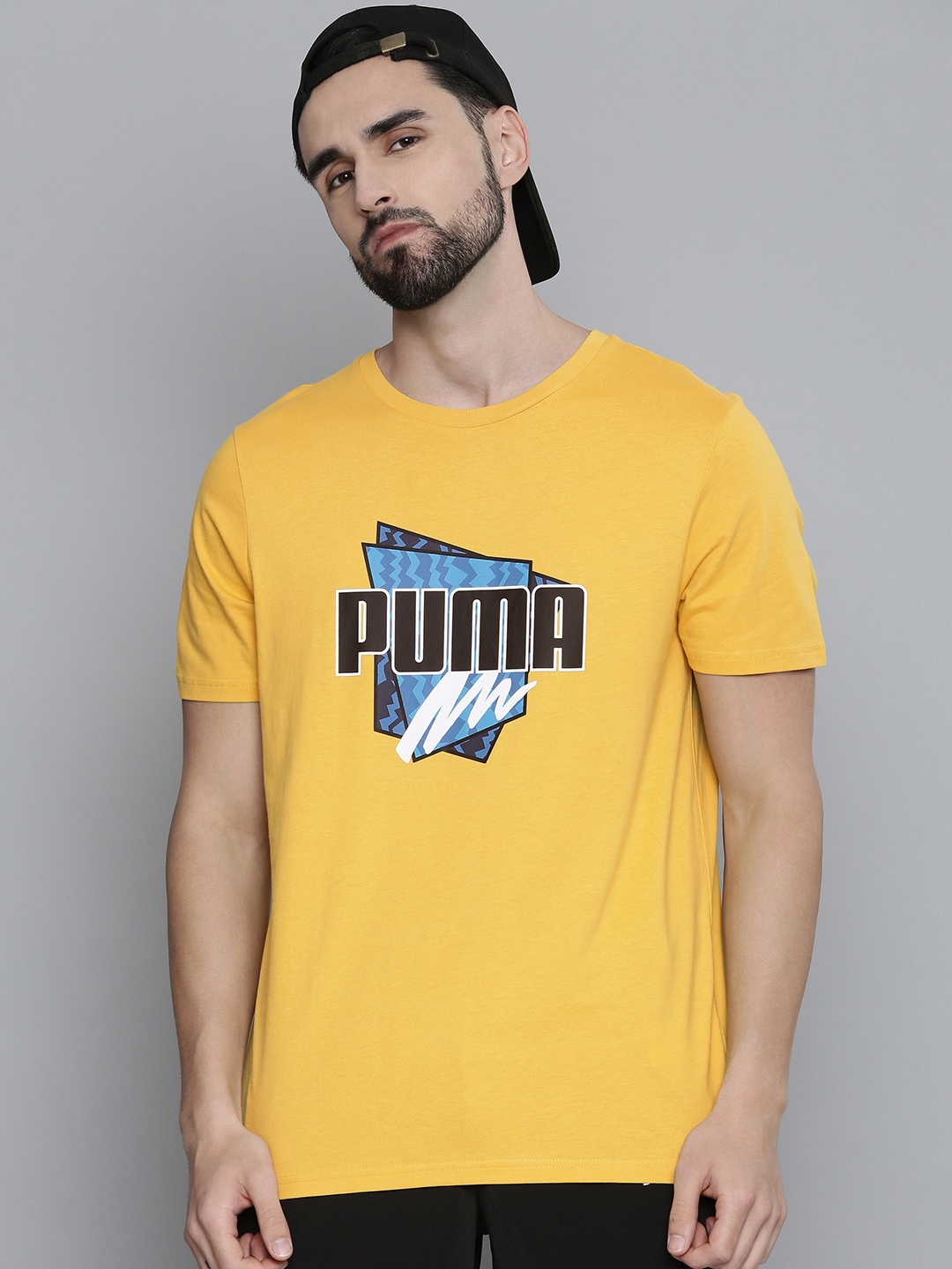 

Puma Men Yellow & Black Regular Fit Brand Logo Printed Summer Graphic T-shirt