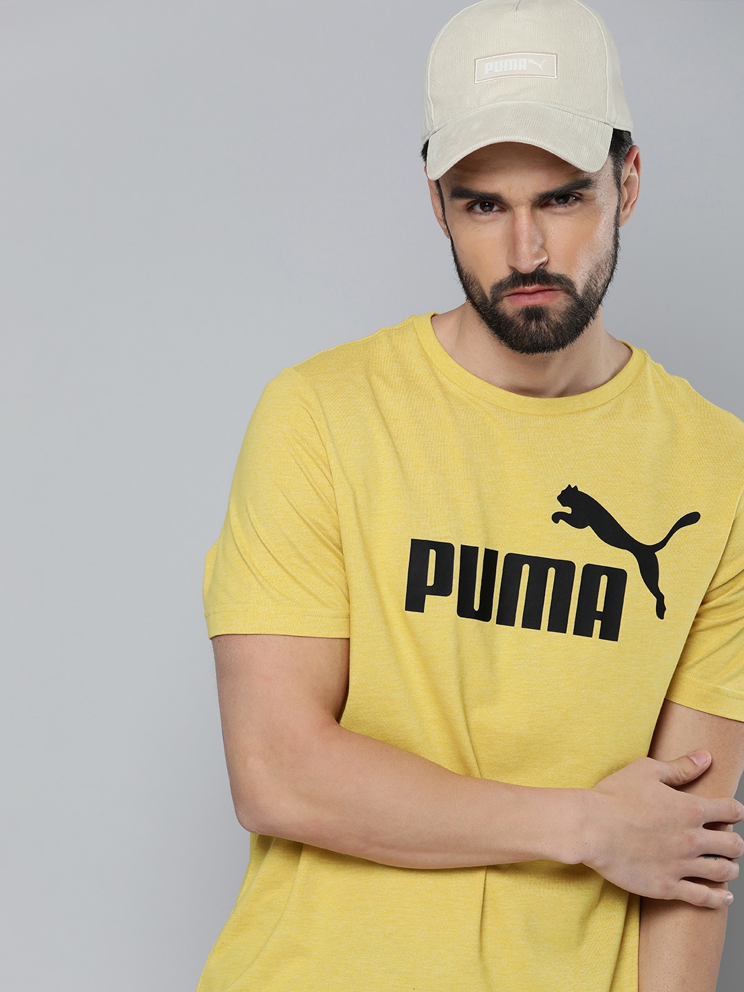 

Puma Men Mustard Yellow & Black Brand Logo Printed Essentials Heather T-shirt