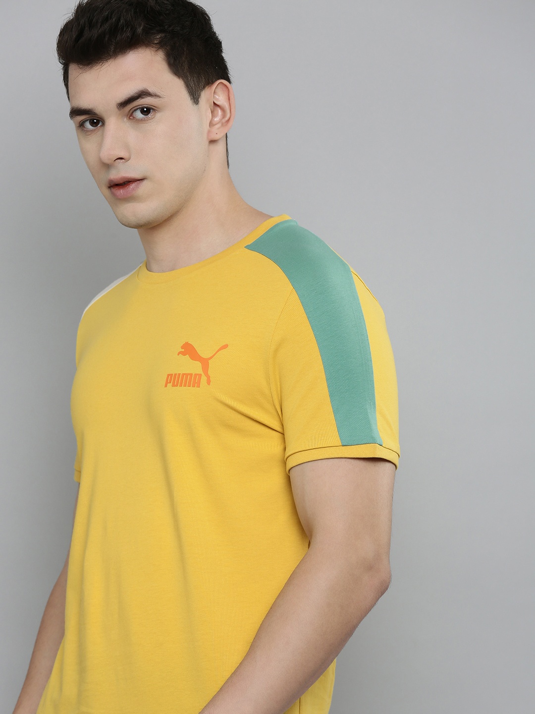 

Puma Men Mustard Yellow Brand Logo Printed Slim Fit T-shirt With Colourblock Side Stripes