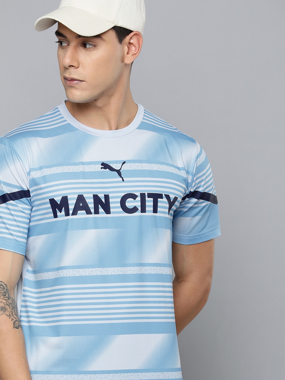 

Puma Manchester City Printed dryCELL Regular Fit Sustainable Football T-shirt, Blue