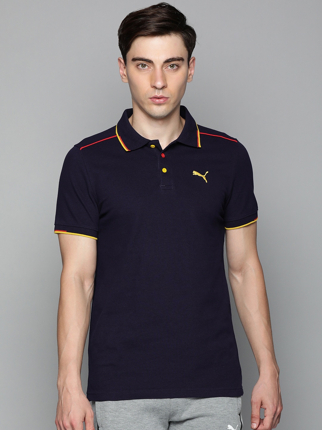 

Puma Men Navy Blue Solid Pure Cotton Polo Collar Slim Fit T-shirt