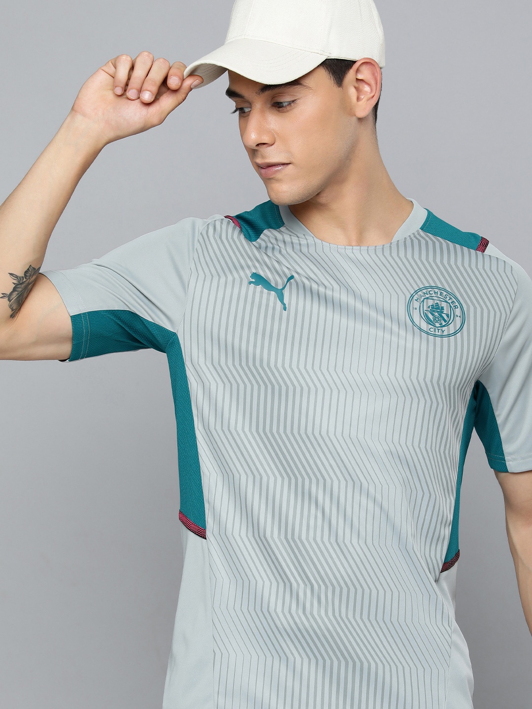 

Puma Men Grey & Blue Manchester City Printed Slim Fit Training Sustainable Football T-shirt