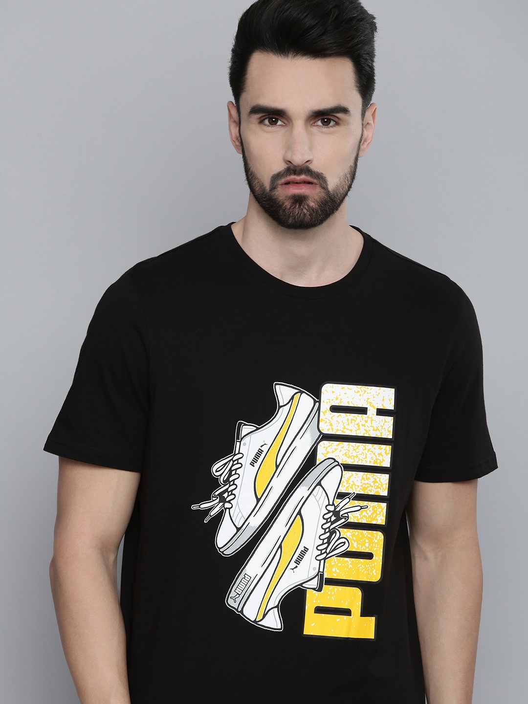 

Puma Men Black & Multicoloured Graphic Printed Regular Fit Casual T-shirt