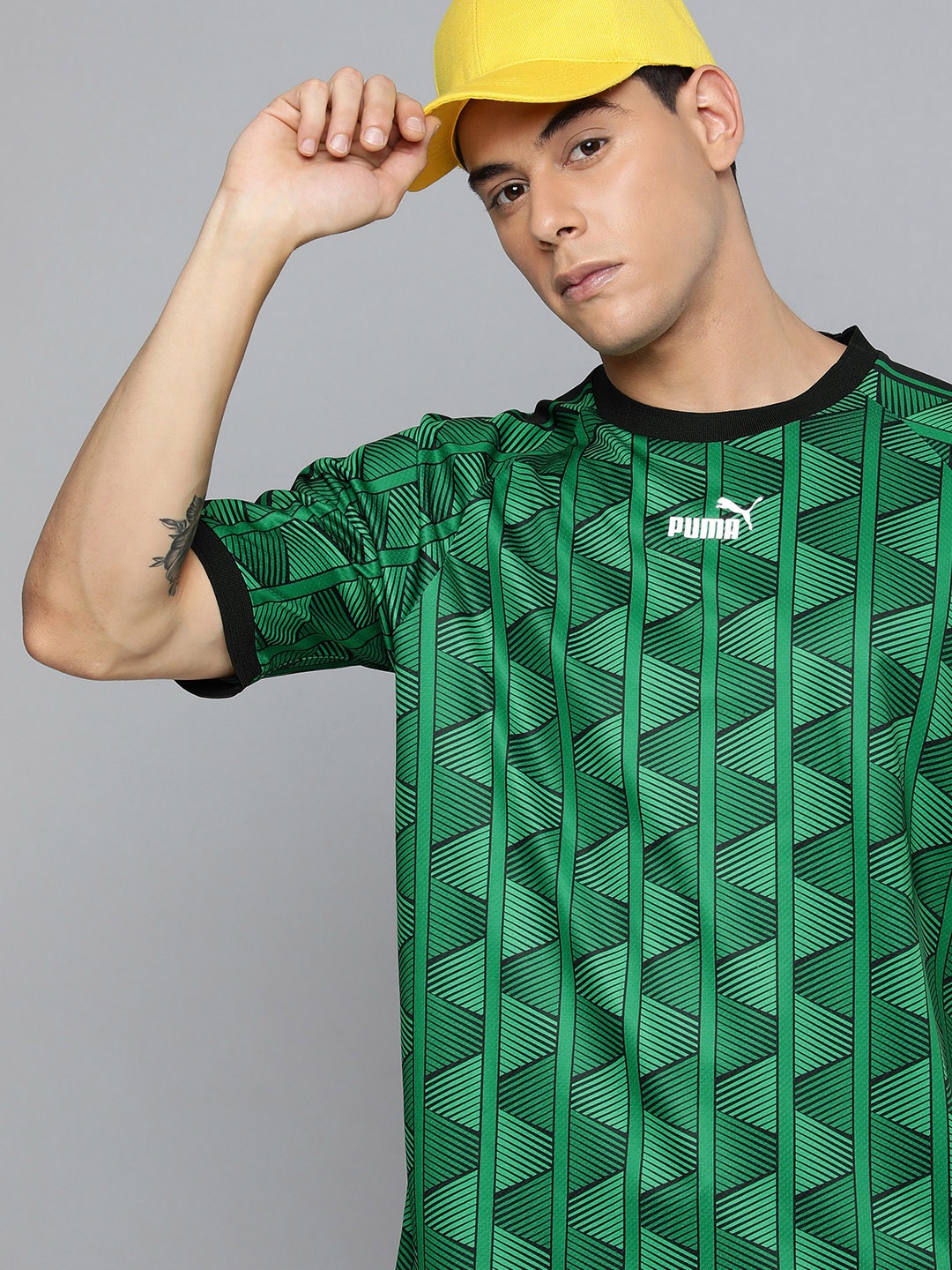 

Puma Men Green & Black Graphic Printed Casual Sustainable T-shirt