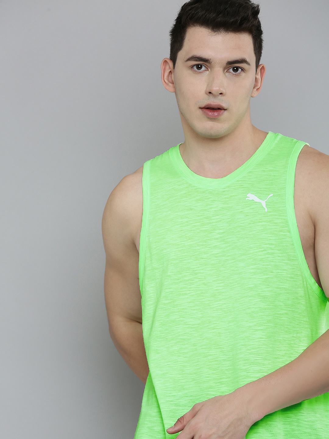 

Puma Men Green Solid Sleeveless Training or Gym T-shirt