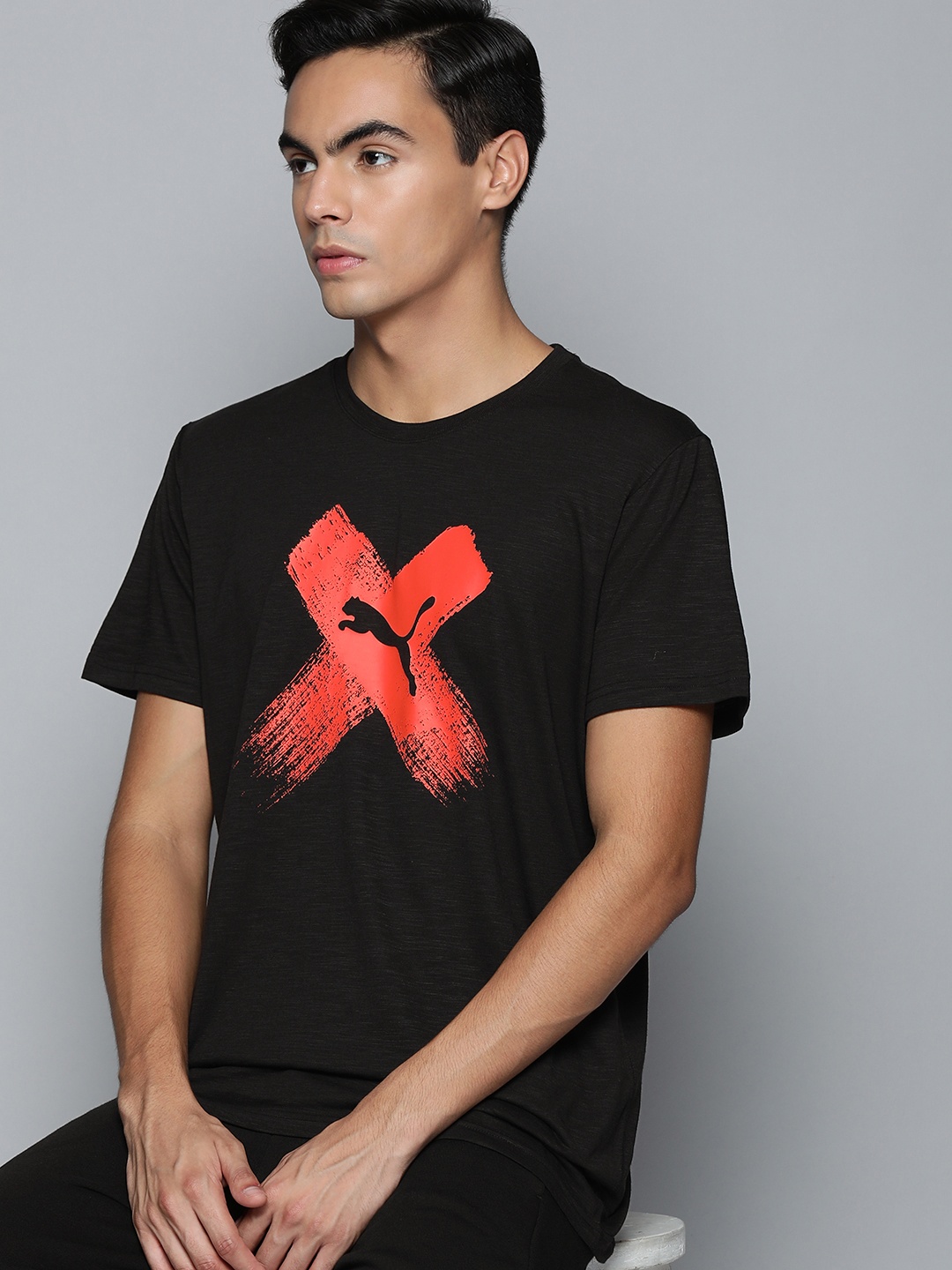 

Puma Men Black & Multicoloured Graphic Printed Training or Gym T-shirt