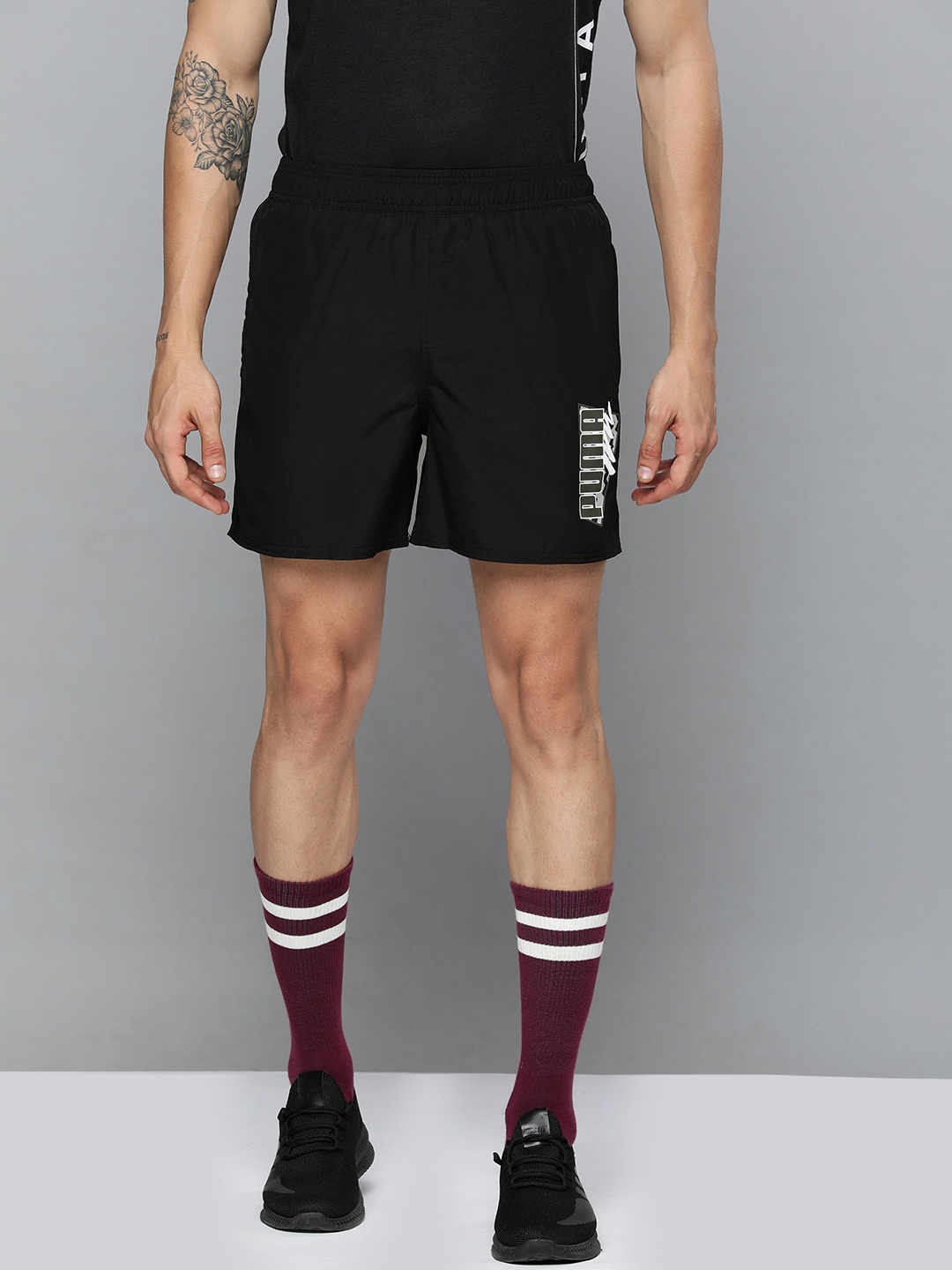 

Puma Men Black Bramd Logo Printed Sports Shorts