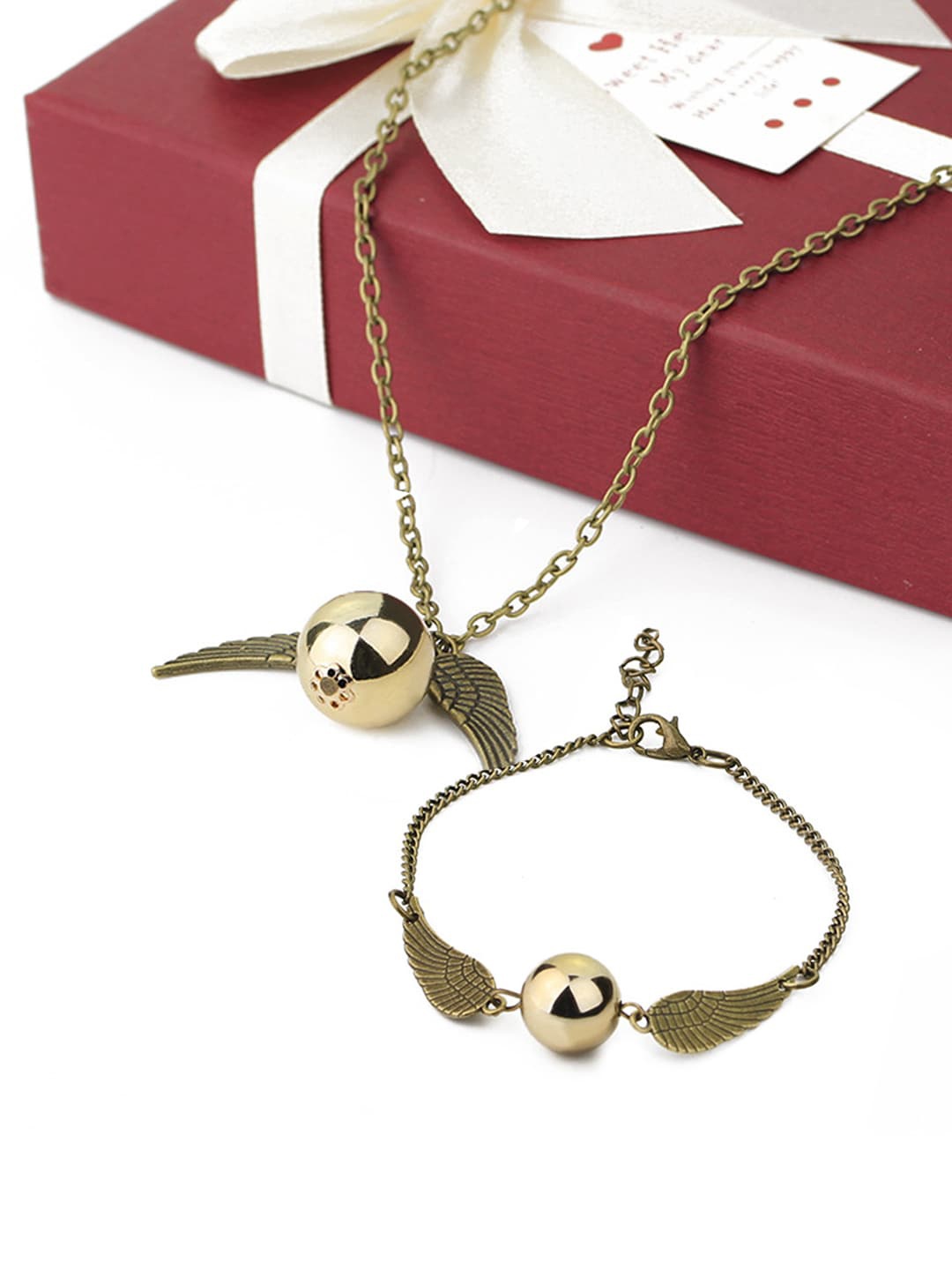 

Yellow Chimes Woman Gold Plated Harry Potter Pendant With Bracelet