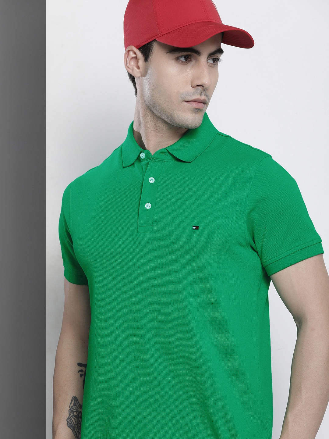 

Tommy Hilfiger Men Green Self Design Polo Collar Slim Fit T-shirt