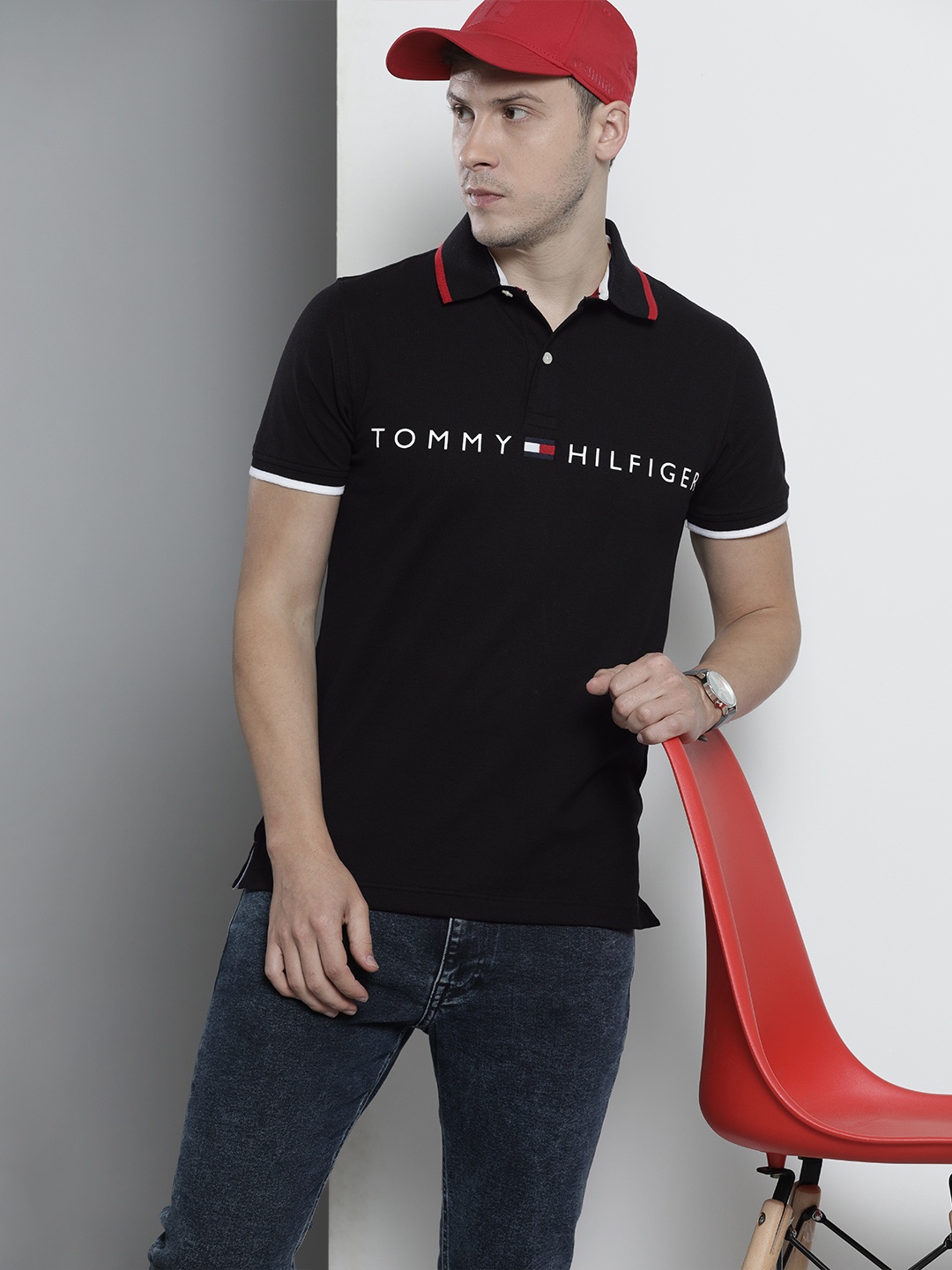

Tommy Hilfiger Men Black Brand Logo Printed Polo Collar Slim Fit T-shirt
