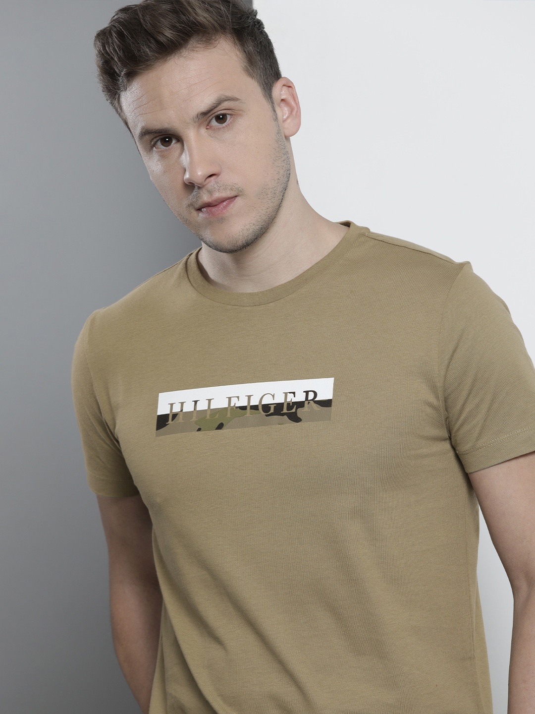 

Tommy Hilfiger Men Olive Green & White Printed T-shirt