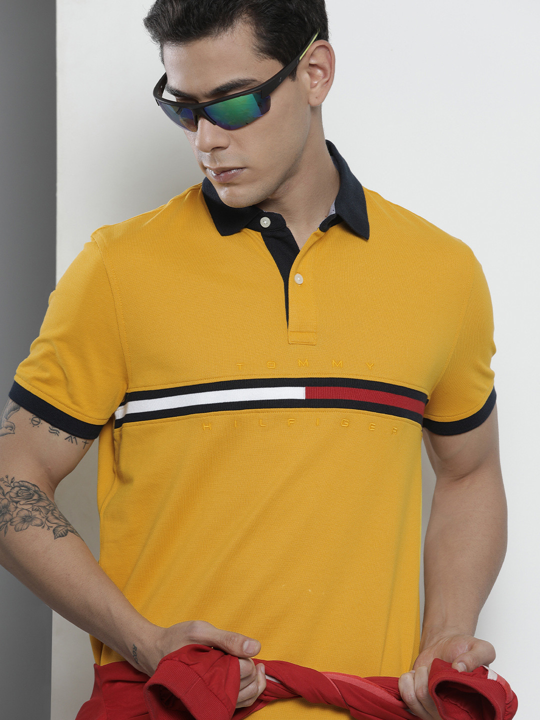 

Tommy Hilfiger Men Yellow & White Colourblocked Polo Collar T-shirt