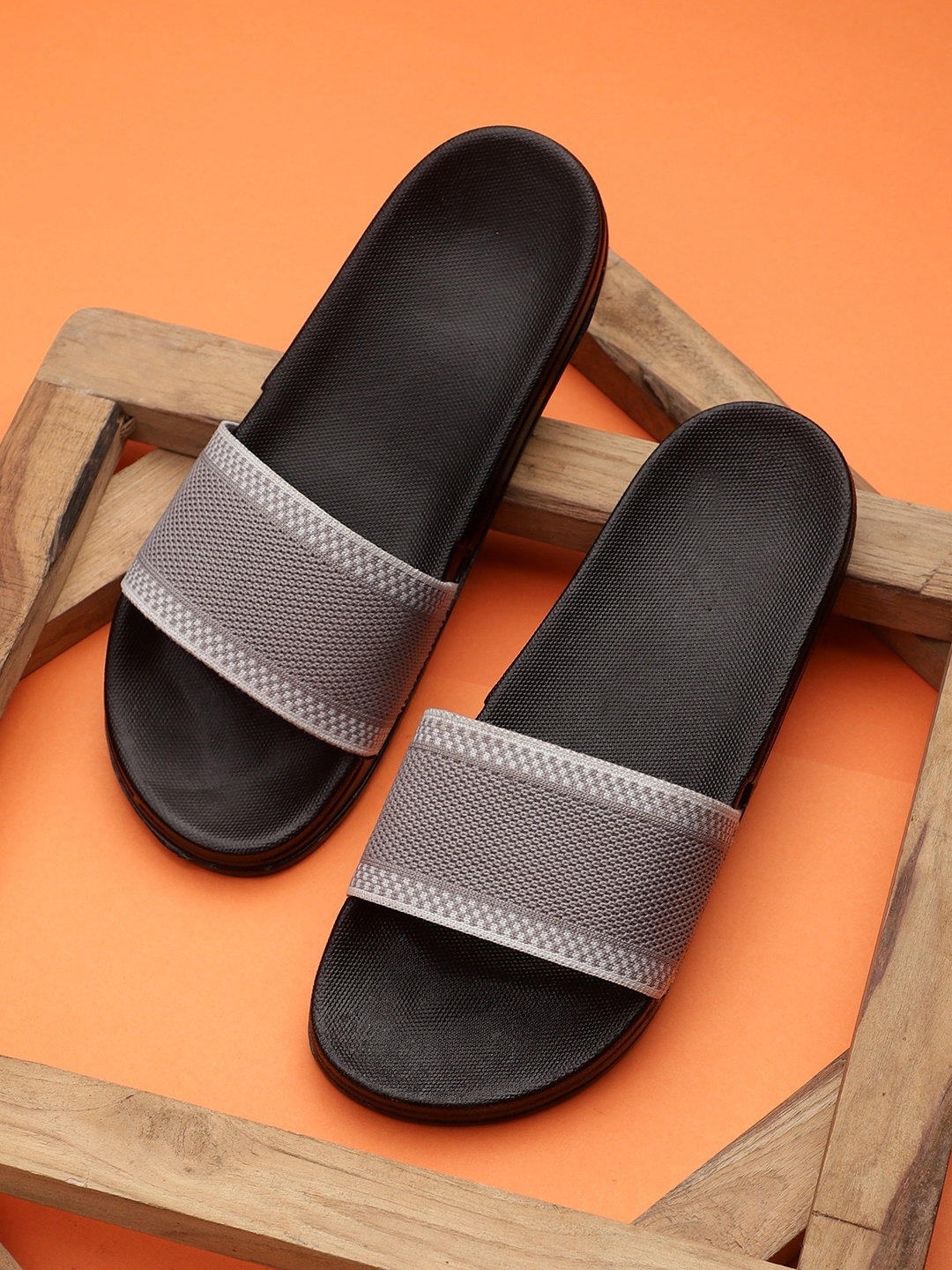 

Pampy Angel Men Grey & White Printed Rubber Sliders