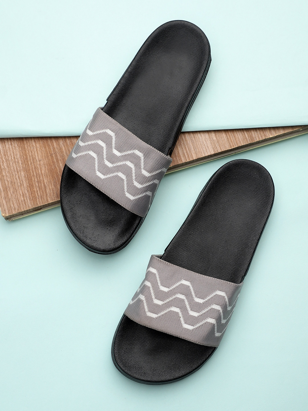 

Pampy Angel Men Grey & White Printed Sliders