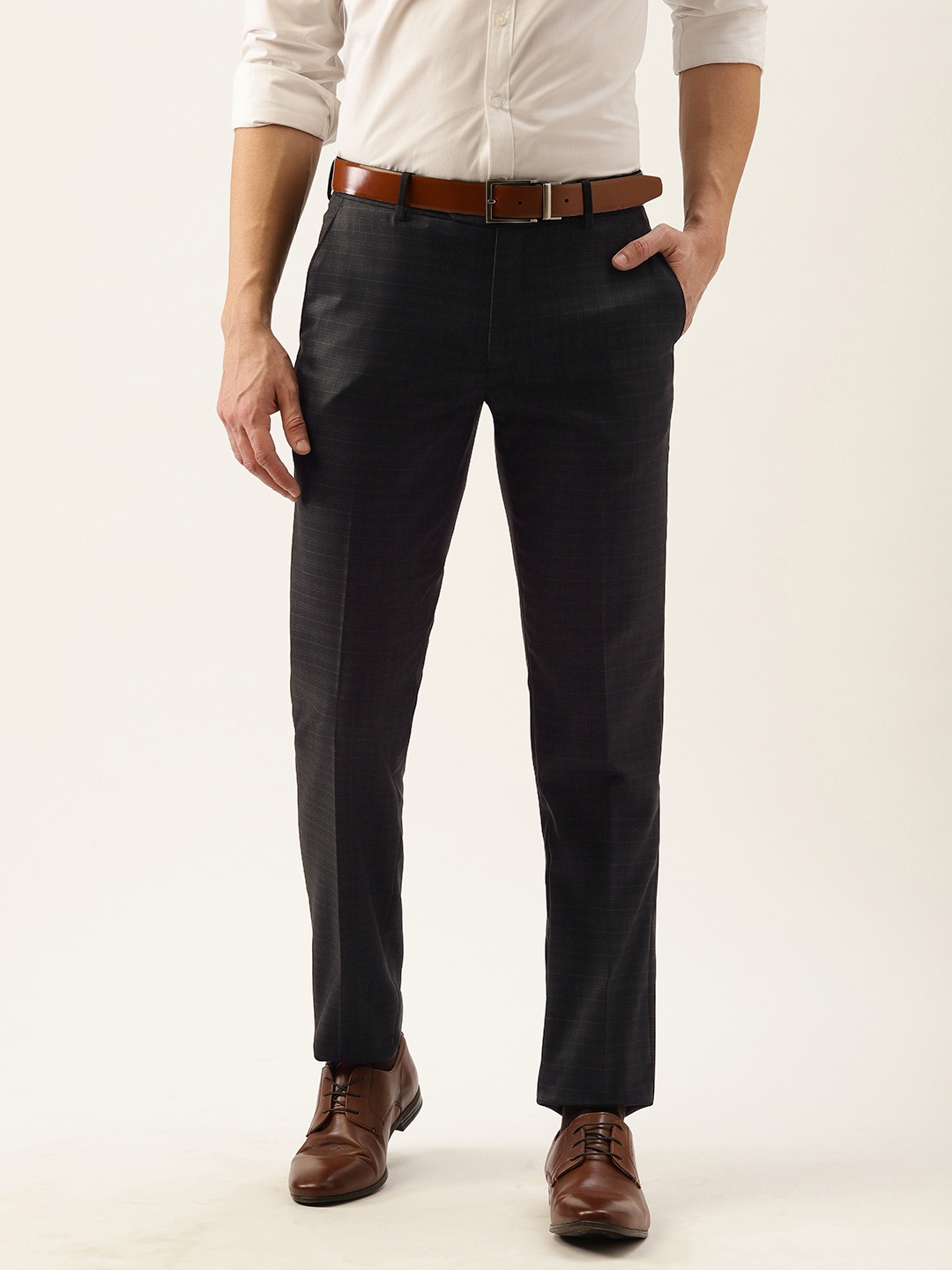 

Peter England Men Black & White Checked Slim Fit Trousers