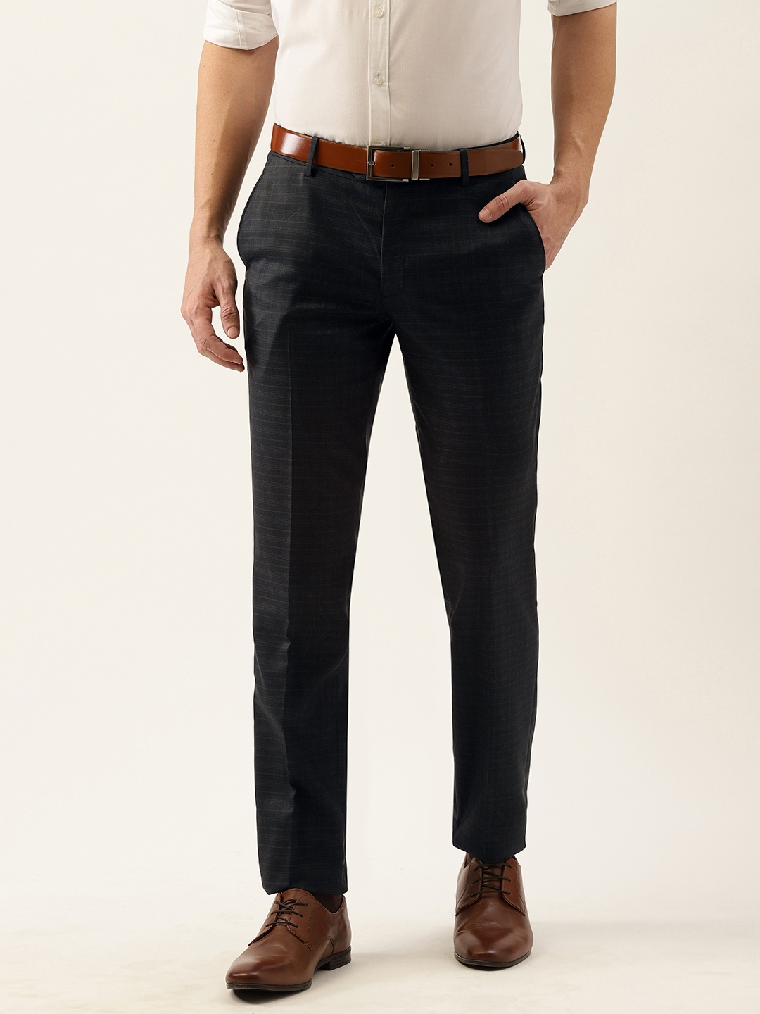 

Peter England Men Black & White Checked Slim Fit Trousers