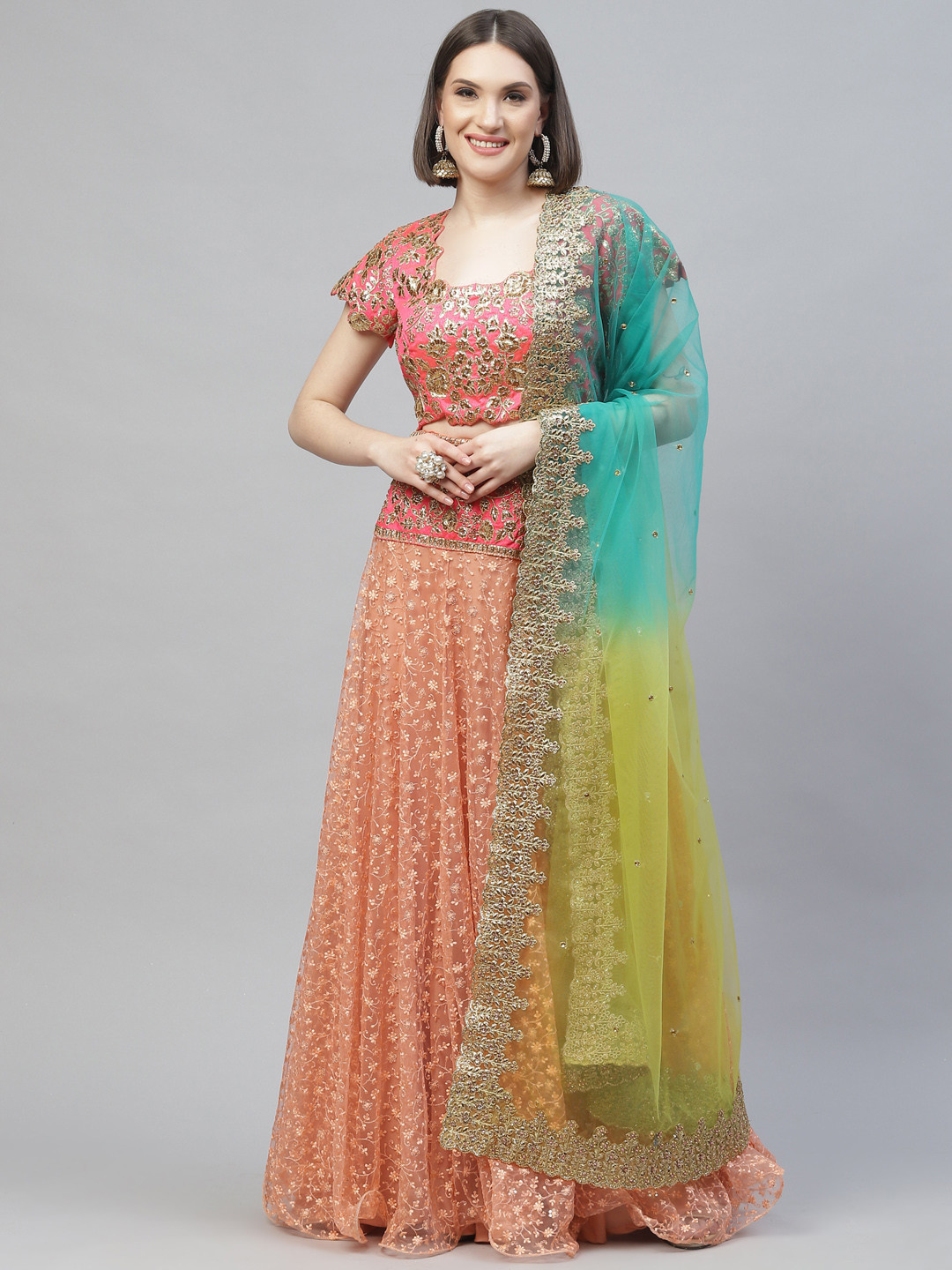 

Readiprint Fashions Peach-Coloured & Yellow Semi-Stitched Lehenga & Unstitched Blouse