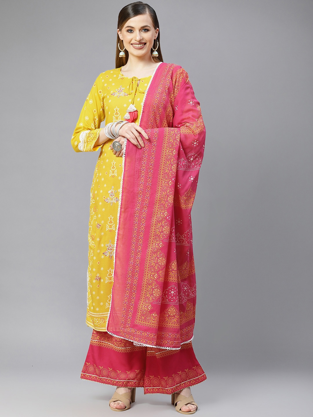 

Indo Era Women Yellow & Pink Ethnic Motifs Printed Kurta with Palazzos & Dupatta