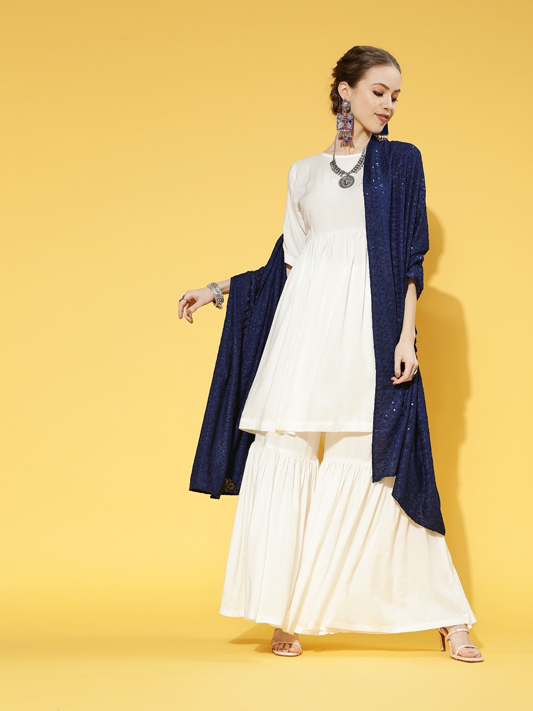 

InWeave Cream Viscose Rayon Short Kurti with Sharara
