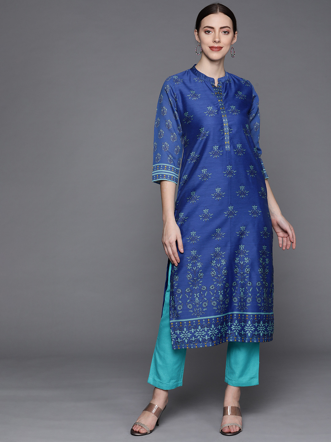 

PINKSKY Women Blue Ethnic Motifs Printed Kurta with Trousers