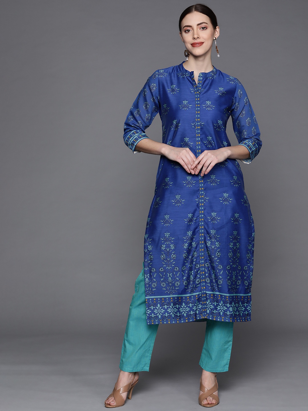 

PINKSKY Women Blue Ethnic Motifs Printed Kurta with Trousers