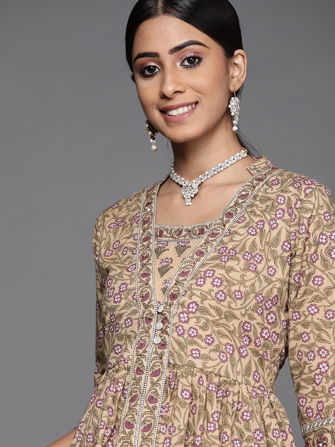 

Libas Women Beige Floral Printed Panelled Pure Cotton Kurta with Palazzos