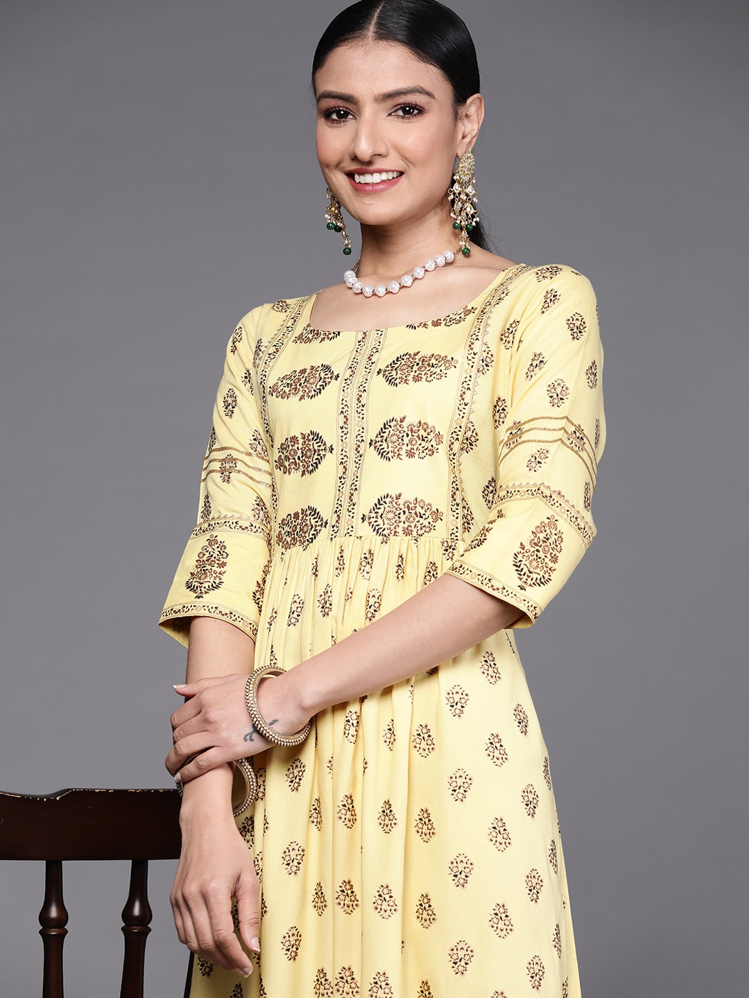 

Libas Yellow & Brown Ethnic Print Maxi Dress